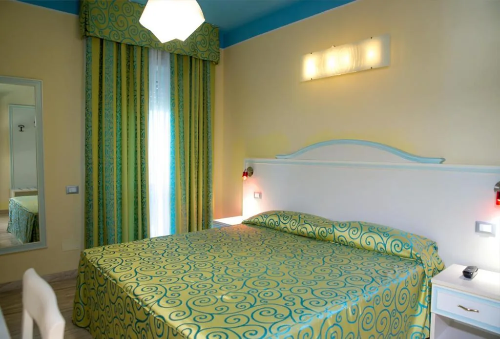 Classic Quadruple Room — Hotel Villa Aurora