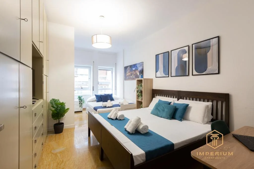Classic Quadruple Room — Imperium Garbatella Guesthouse – 2 bedrooms with private bathroom, Terrace, 800mt to metro