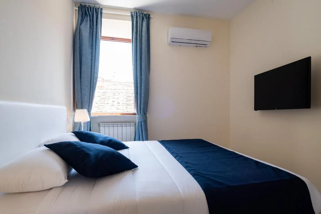 Classic Quadruple Room — Minerva Monks Inn