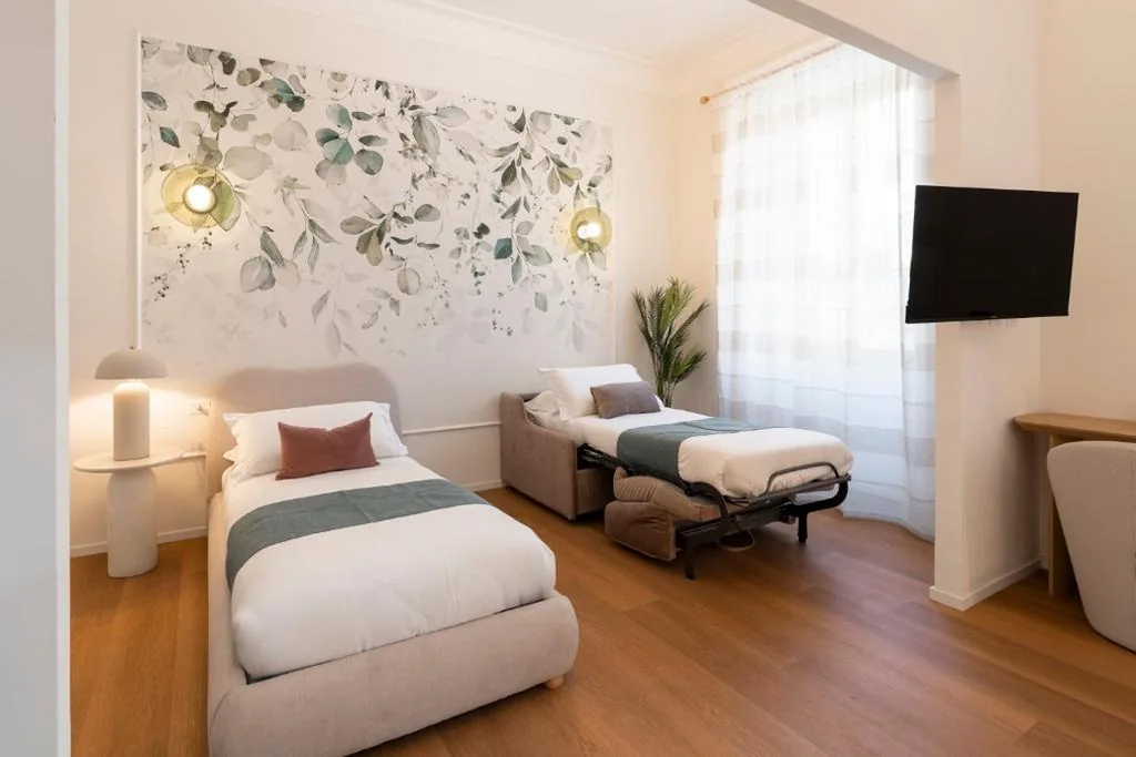 Classic Quadruple Room — ReRent Rooms – 81 Manzoni Guesthouse