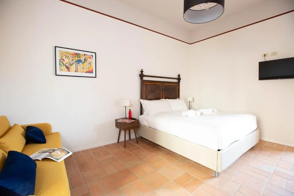Quadruple Room — Colosseum Suites – Zen 22