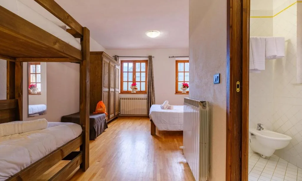 Camera Quadrupla Comfort — Chalet Le Alpi – Azzurro Club