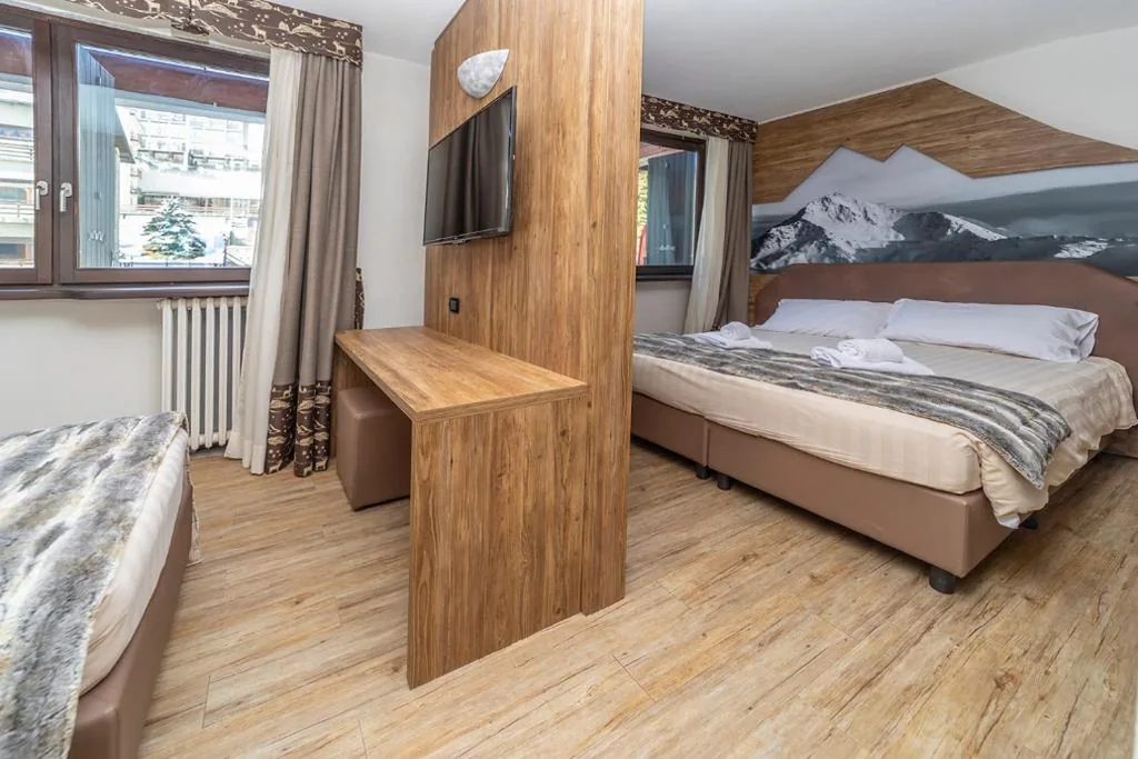 Comfort Quadruple Room — Hotel Du Col