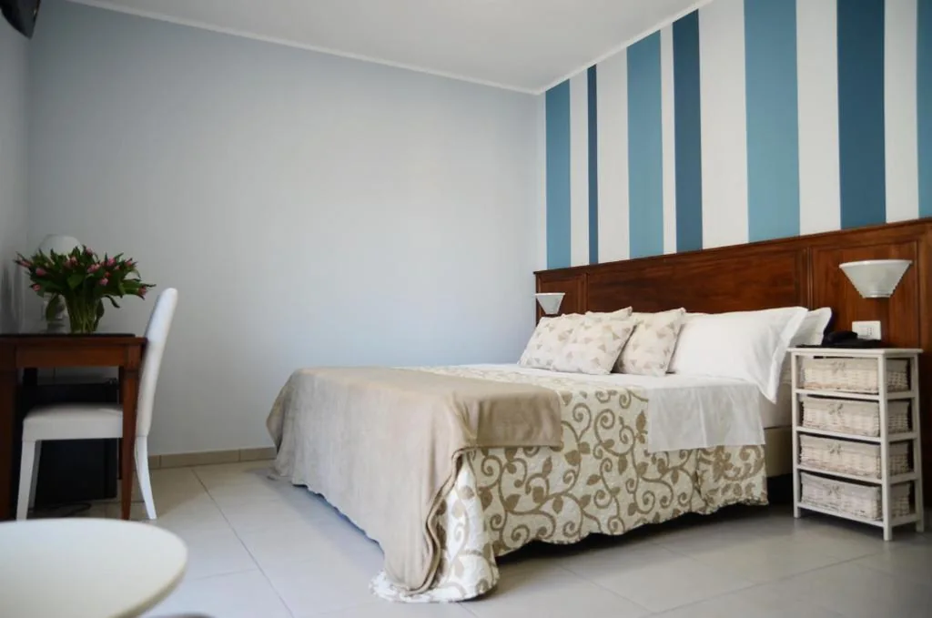 Camera Quadrupla Comfort — Hotel Giulio Cesare