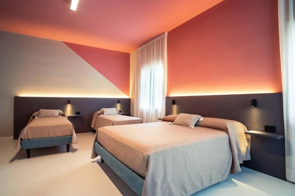 Camera Quadrupla Comfort — La Maison – Boutique Rooms