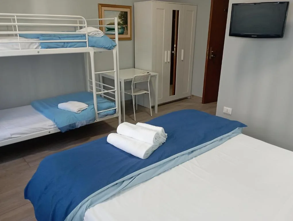 Comfort Quadruple Room — NEW PARADISE
