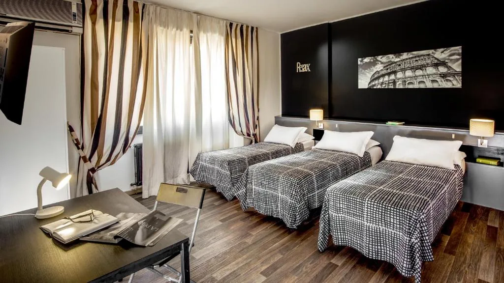 Camera Quadrupla Comfort — Radio Hotel