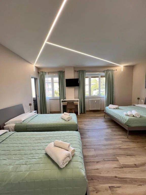 Camera Quadrupla Comfort — Raffaelli Suite