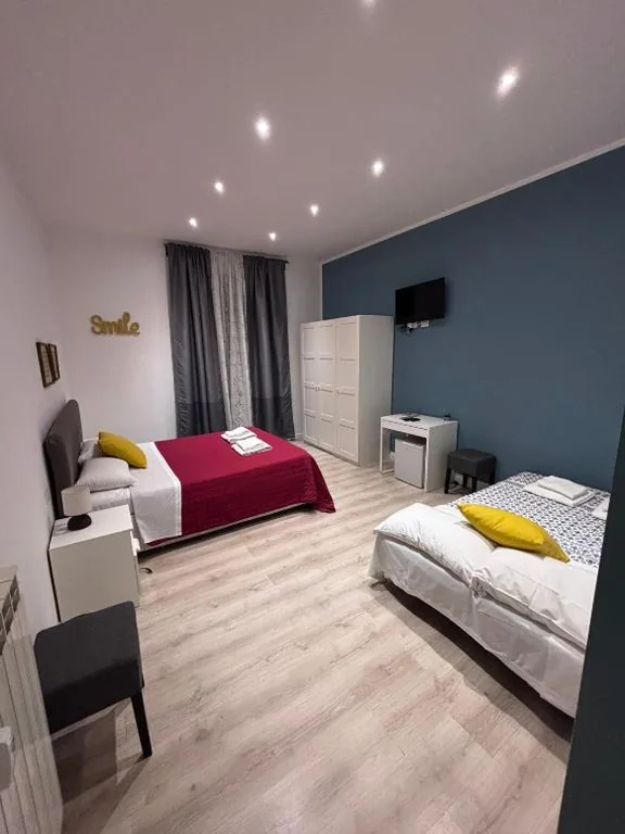 Comfort Quadruple Room — Spazio Cavour Guesthouse