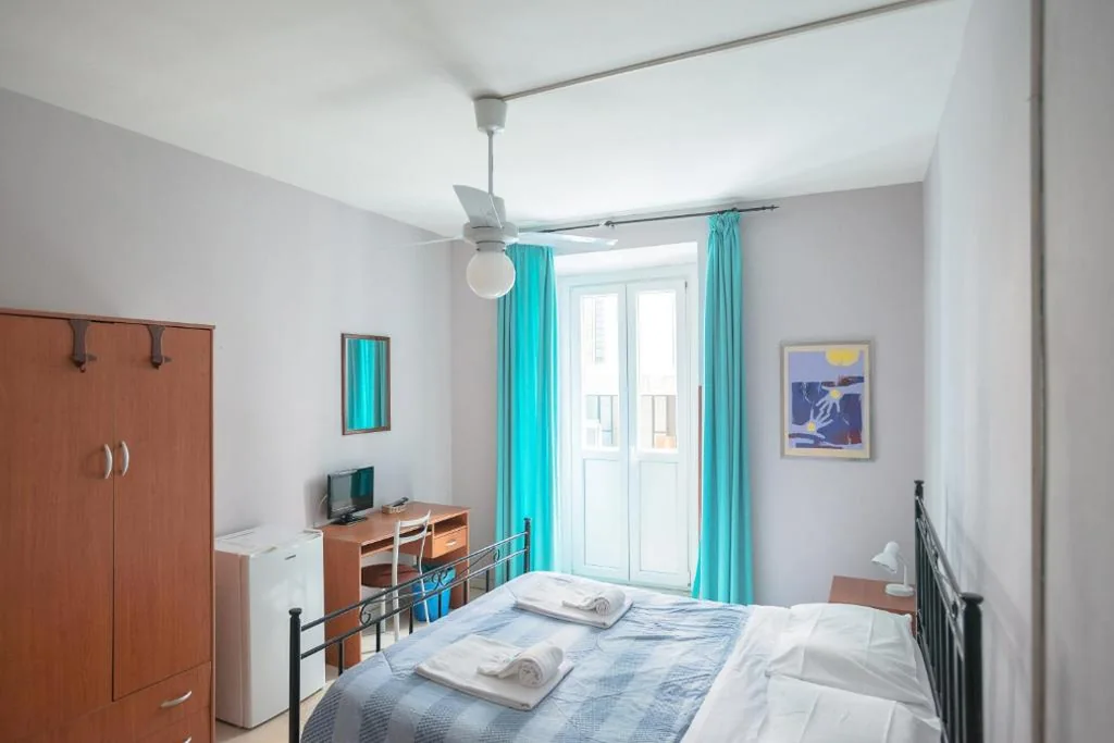 Quadruple Room with Shared Bathroom — Gialel Guesthouse