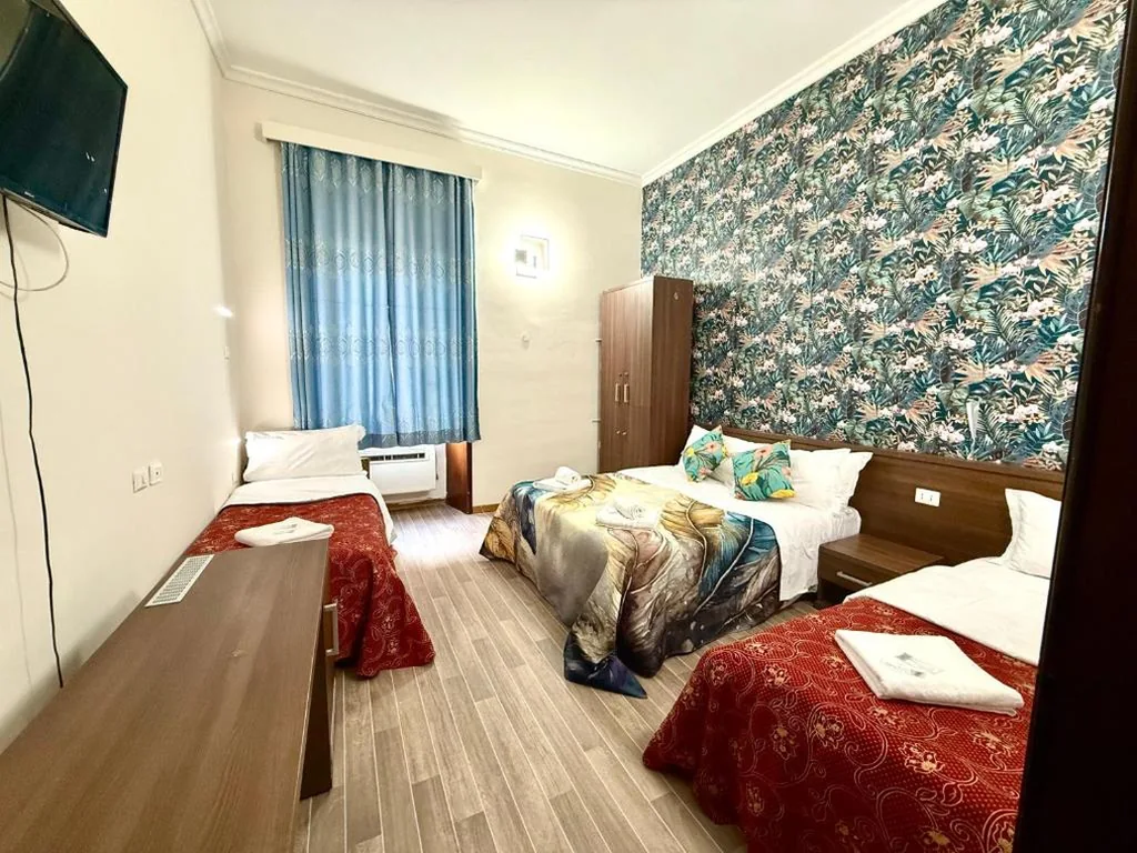 Quadruple Room with Shared Bathroom — Royal Termini Guest House