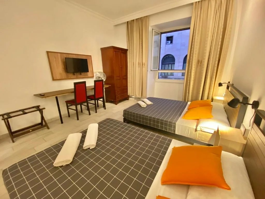 Quadruple Room with Bathroom — Overseas Guesthouse