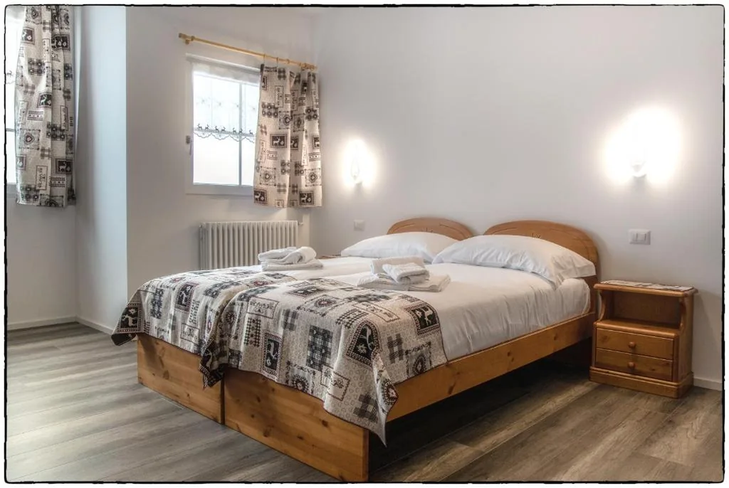 Camera Quadrupla con Bagno Privato — Albergo Ristorante Le Alpi