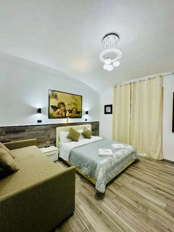 Quadruple Room with Private Bathroom — Breking Roma