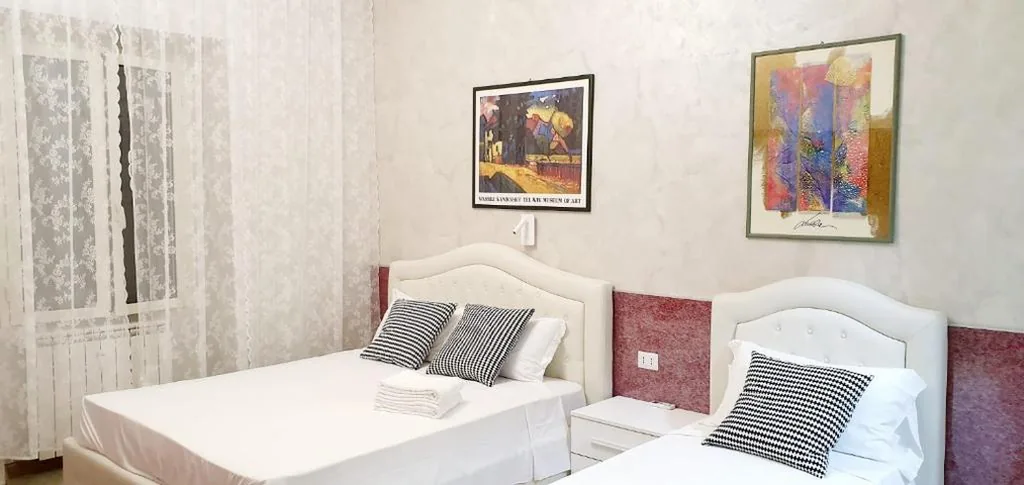 Quadruple Room with Private Bathroom — Captin Home Roma