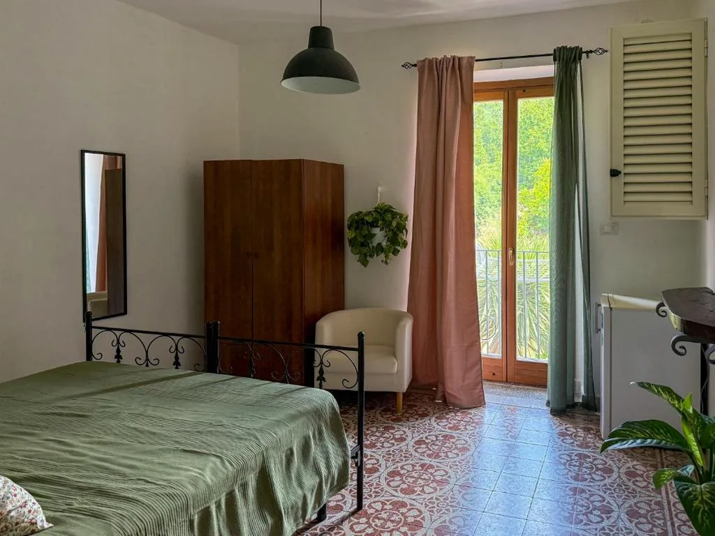 Quadruple Room with Private Bathroom — Casa Petra