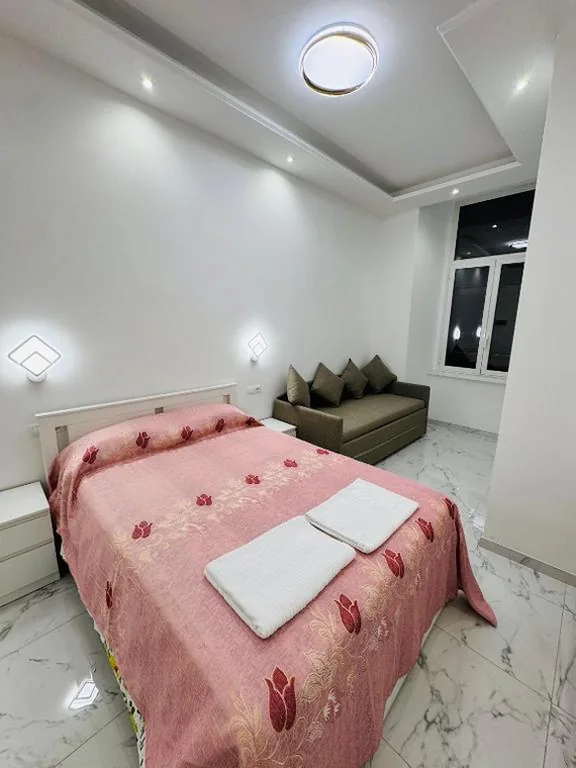 Quadruple Room with Private Bathroom — Casa Roma