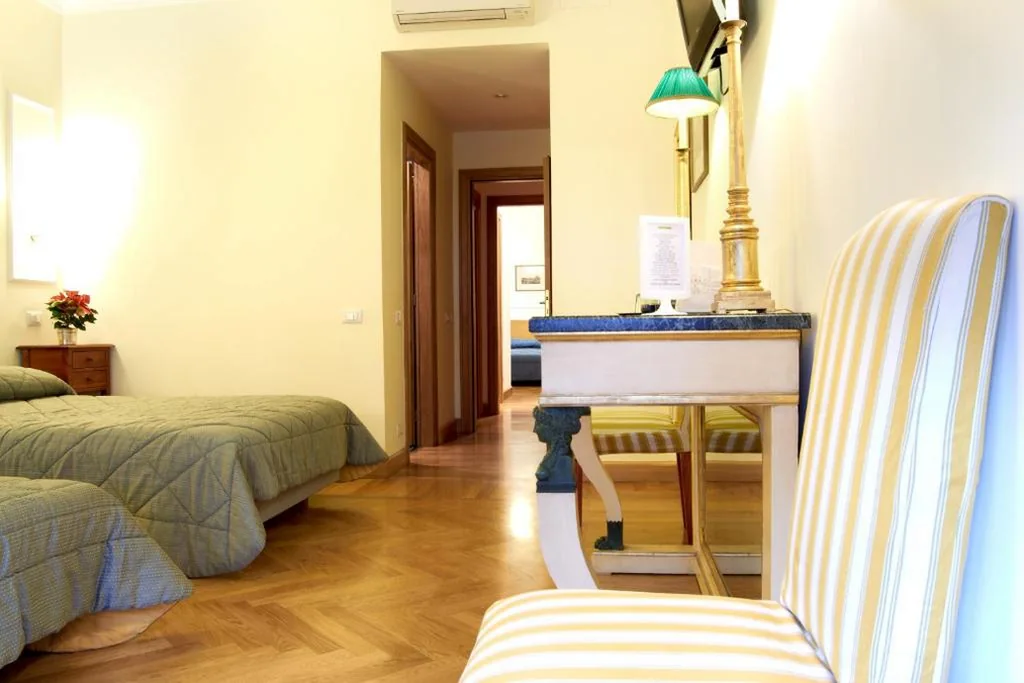 Quadruple Room with Private Bathroom — Domus Cavour Guest house