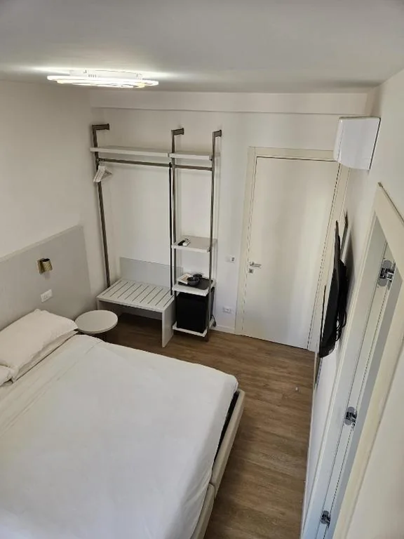 Quadruple Room with External Private Bathroom — Toto San Paolo Rooms