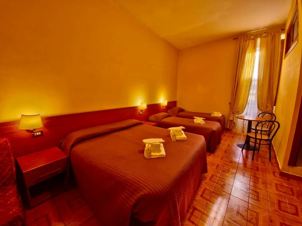 Quadruple Room with Private Bathroom — Hotel Azzurra