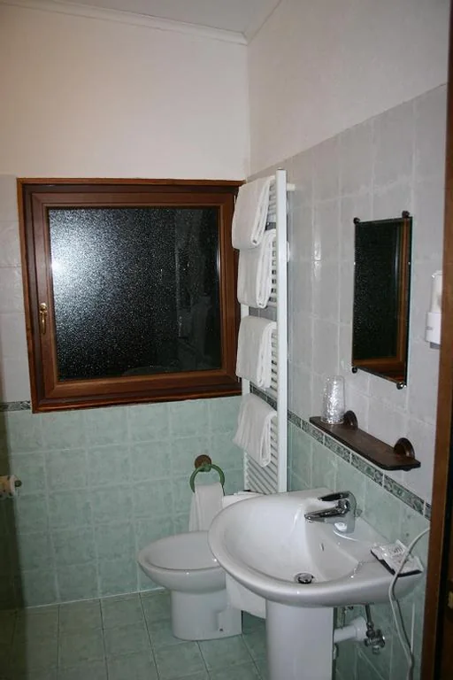Camera Quadrupla con Bagno Privato — Hotel La Pigna