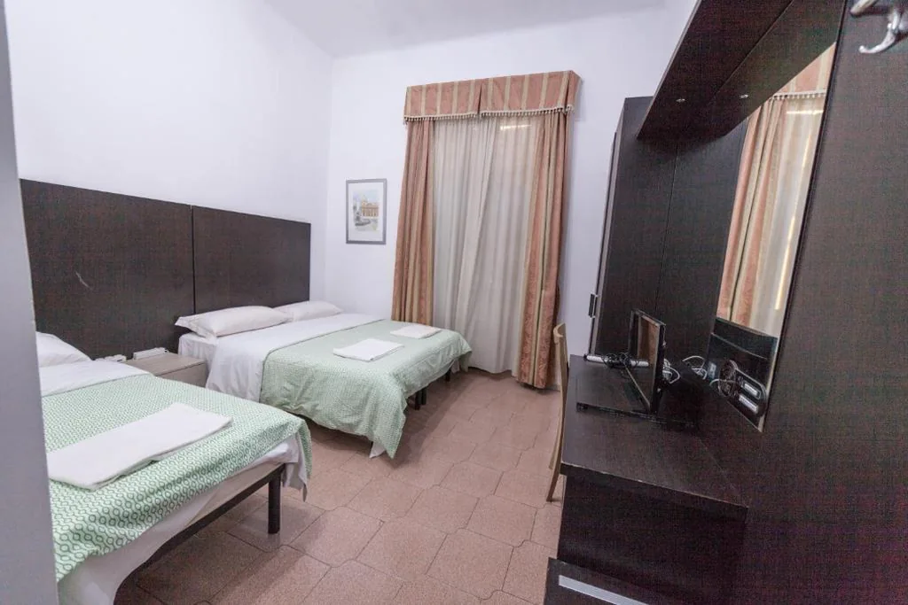 Quadruple Room with Private Bathroom — Lemei House