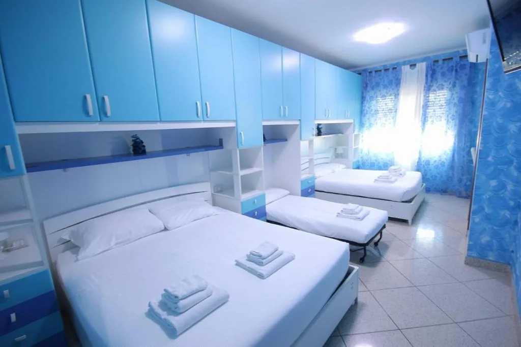 Quadruple Room with Private Bathroom — Marco Aurelio