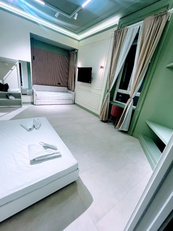 Quadruple Room with Private Bathroom — Mia House Prestige