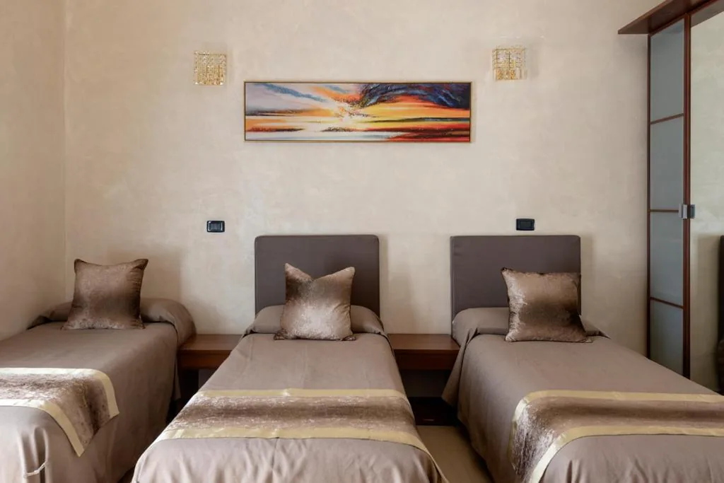 Camera Quadrupla con Bagno Privato — New Joyful Guest House