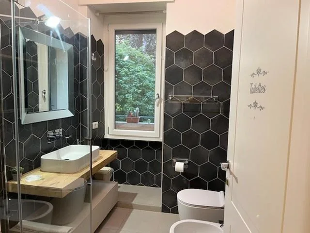 Quadruple Room with Private Bathroom — PiazzaBolognaStay
