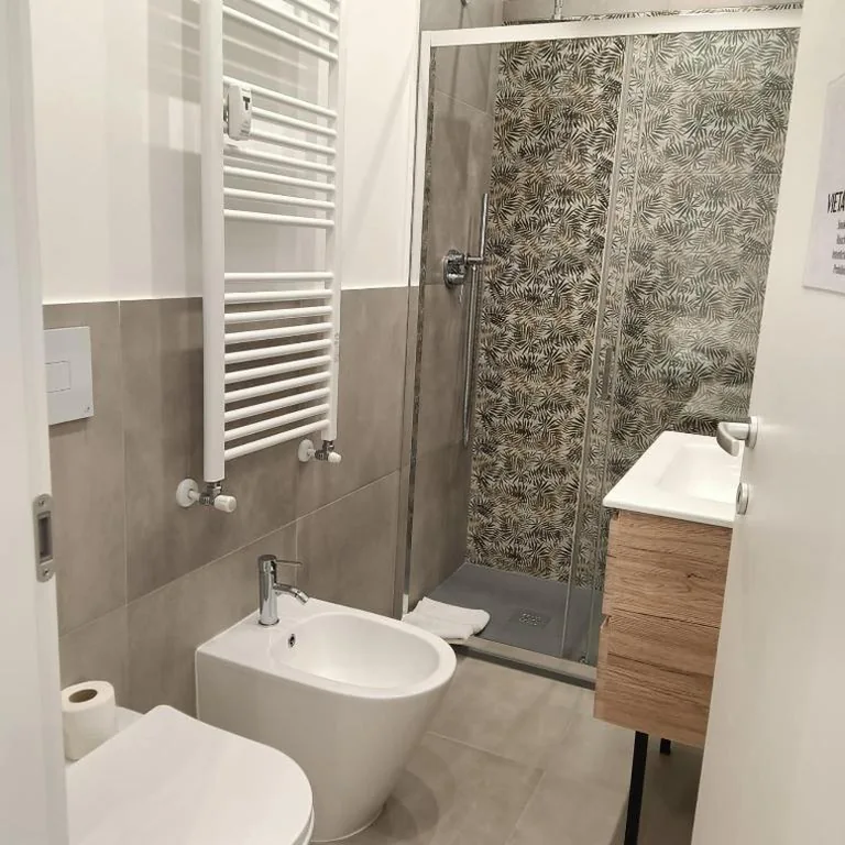 Quadruple Room with Private Bathroom — Porta Nuova Suite 57