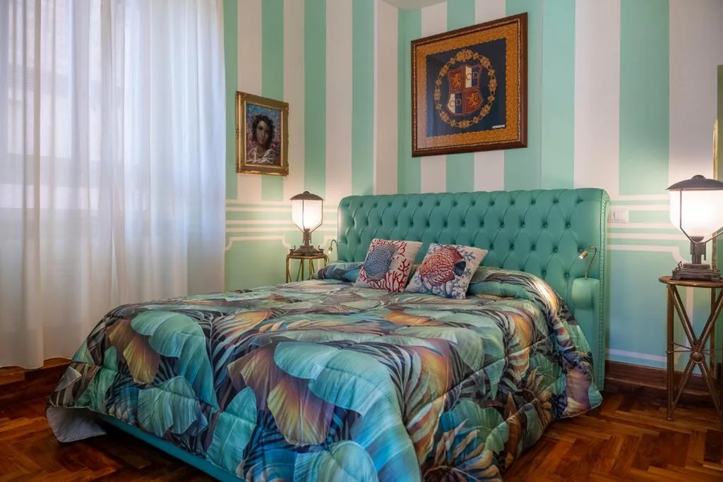 Camera Quadrupla con Bagno Privato — Regal House Anzio Manetti 16