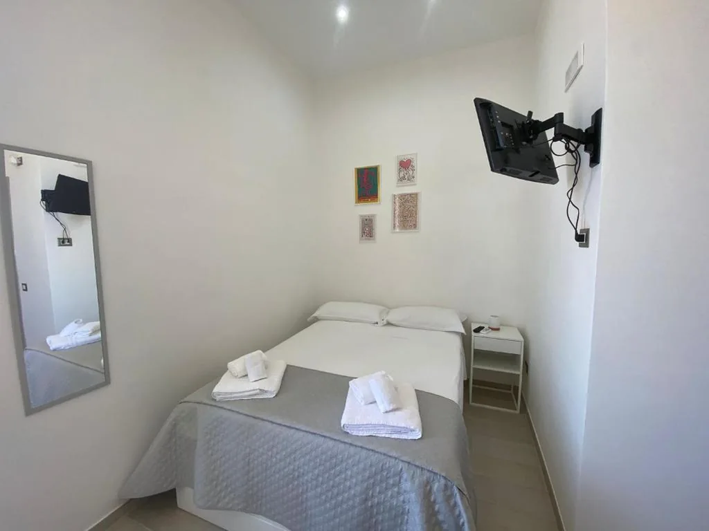 Quadruple Room with Private Bathroom — Residenza Baffra