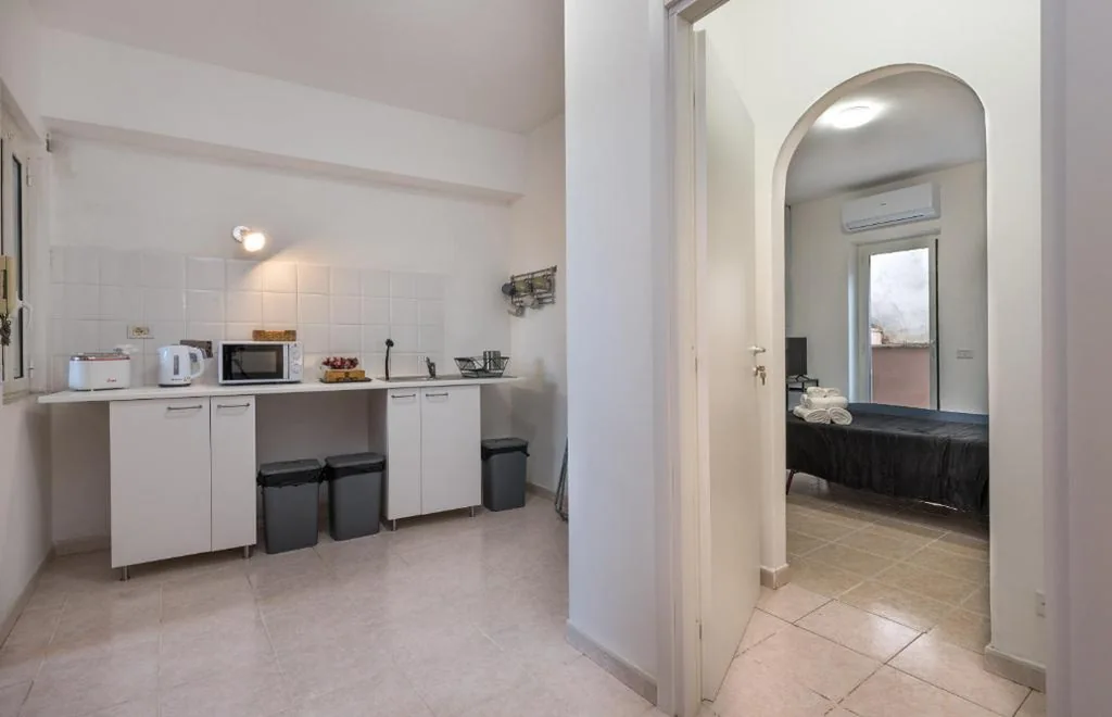 Quadruple Room with Private Bathroom — Travelershome Ciampino 170 Station Street