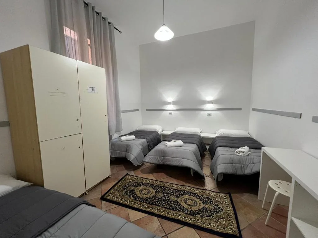 Quadruple Room with Private Bathroom — Zidan Guest House