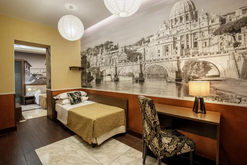 Quadruple Room with Balcony — Corso Grand Suite