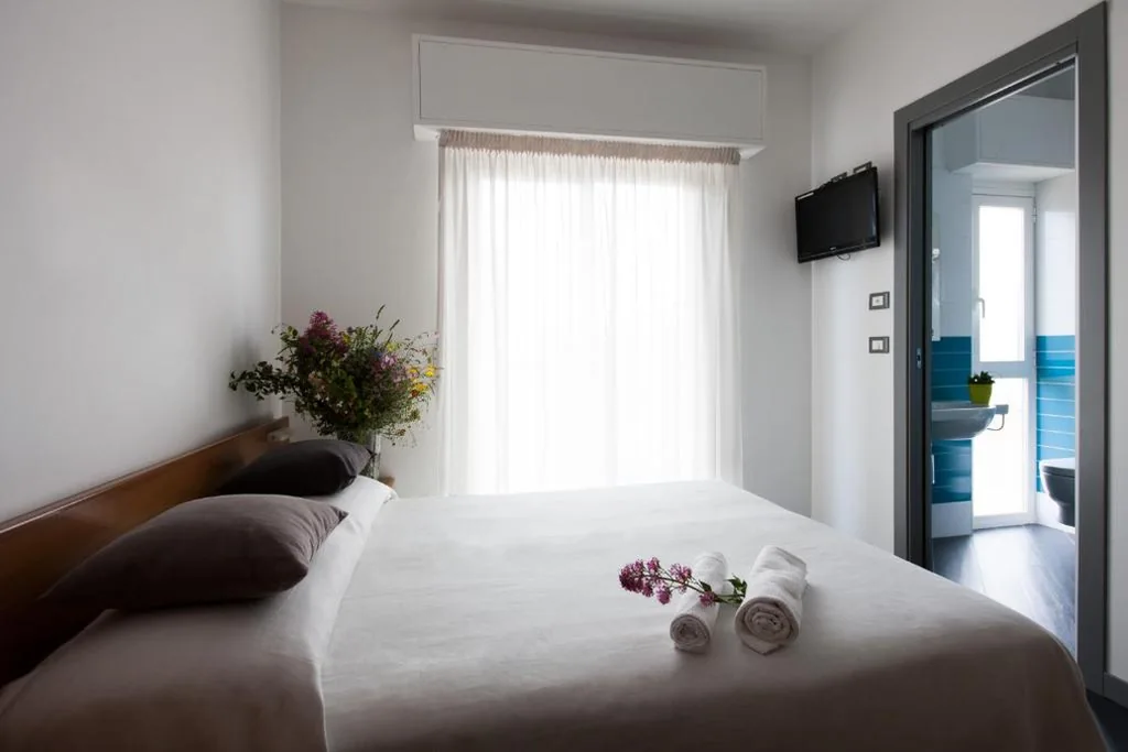 Quadruple Room with Balcony — Hotel Liliana
