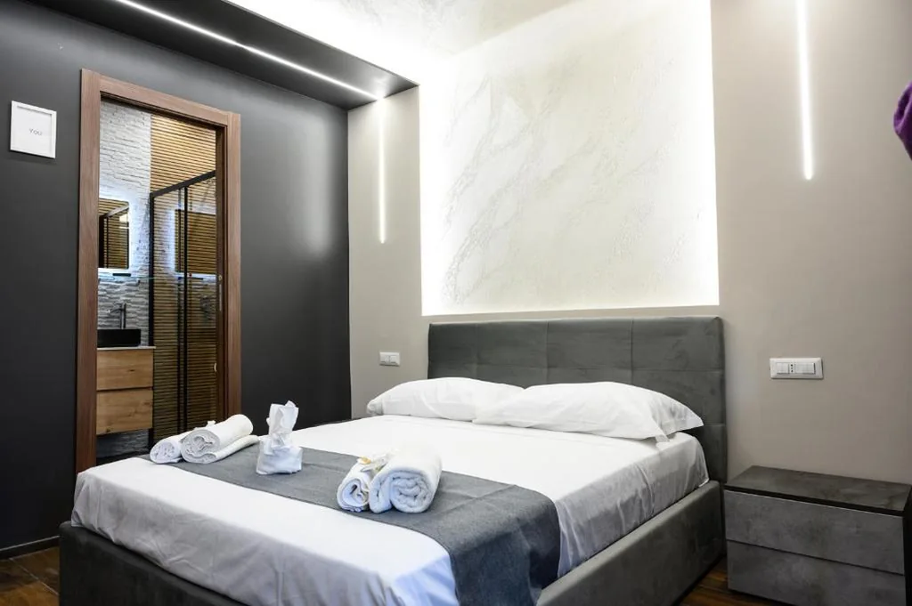 Quadruple Room with Balcony — La Dimora del Re