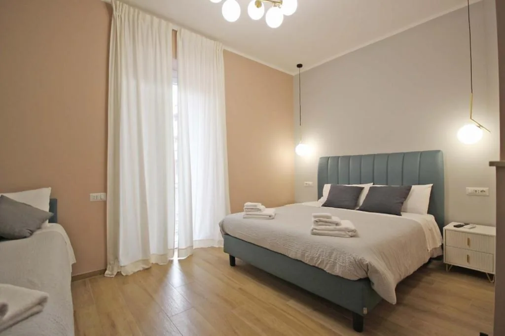 Quadruple Room with Balcony — Roma Nostra Luxury B&B