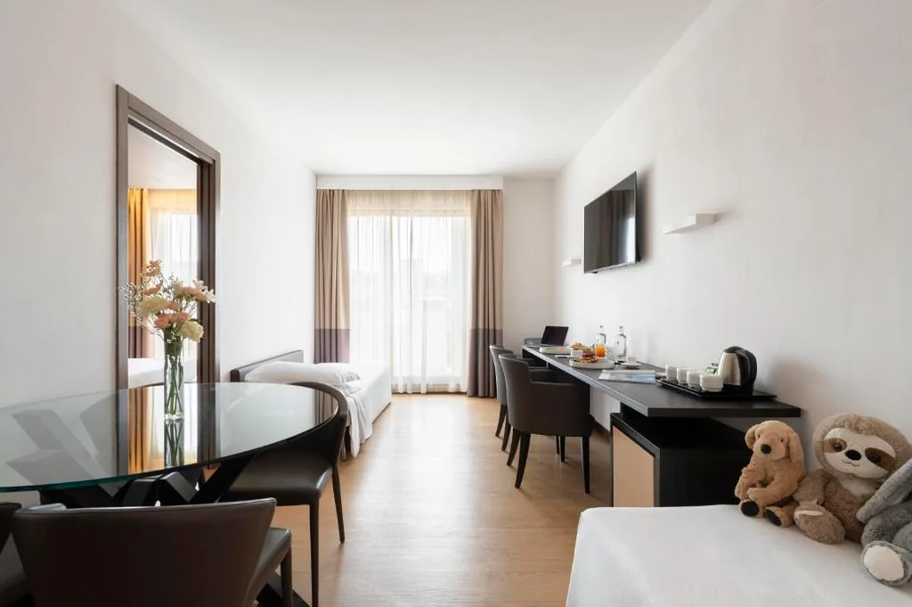 Quadruple Room with Balcony — Warmthotel