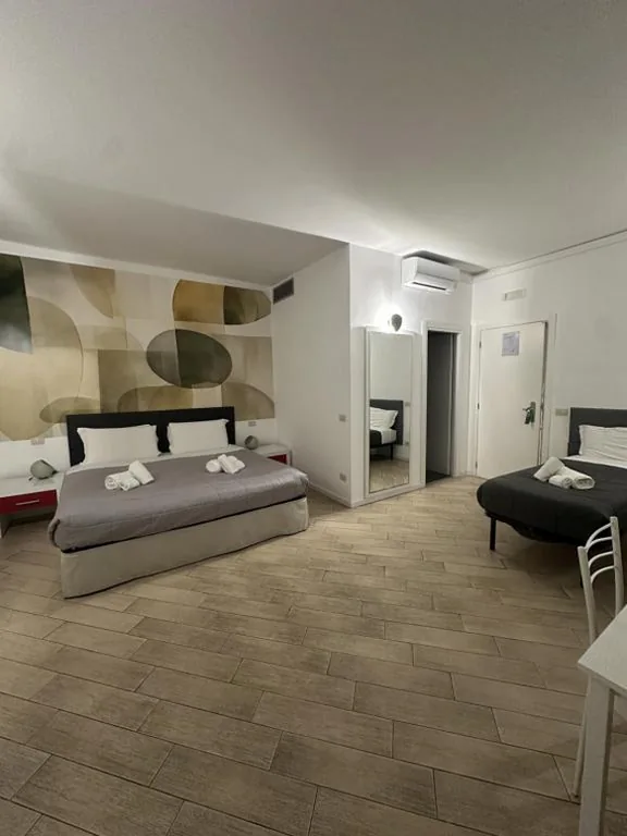Camera Quadrupla con Vista Cortile — B&B A Picture of Rome