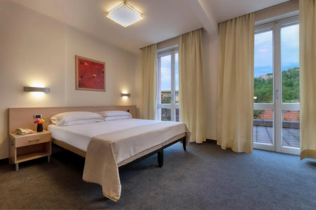 Quadruple Room with Garden View — B&B HOTELS Park Hotel Mondovì