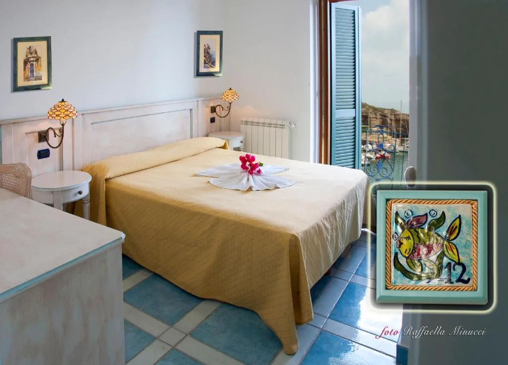 Camera Quadrupla con Vista Giardino — Hotel Isolabella