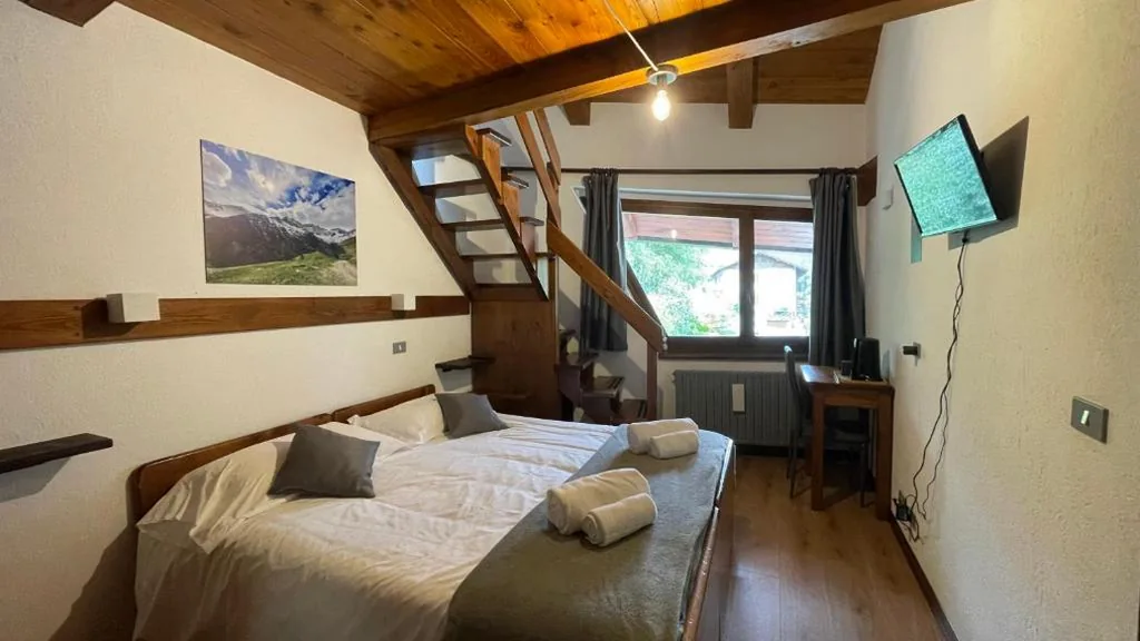 Camera Quadrupla con Vista Montagna — Chalet Bellevue