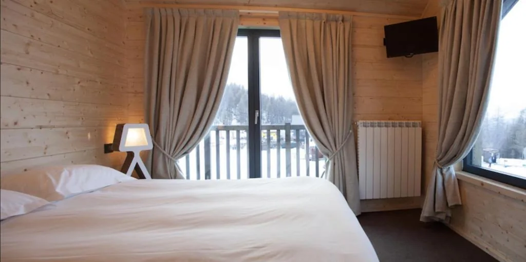Camera Quadrupla con Vista Montagna — Orso Bianco Hotel & Chalet