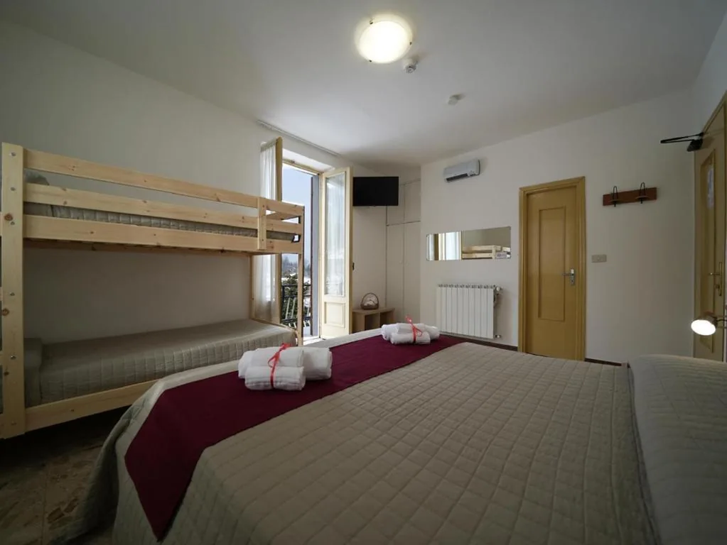 Camera Quadrupla con Vista Montagna — Skilift