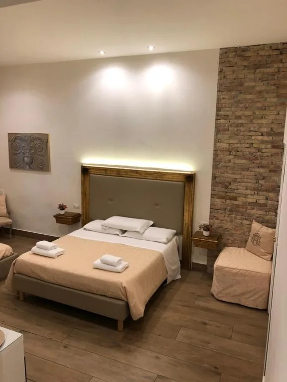 Deluxe Quadruple Room — Art Atelier Accomodation Guest House