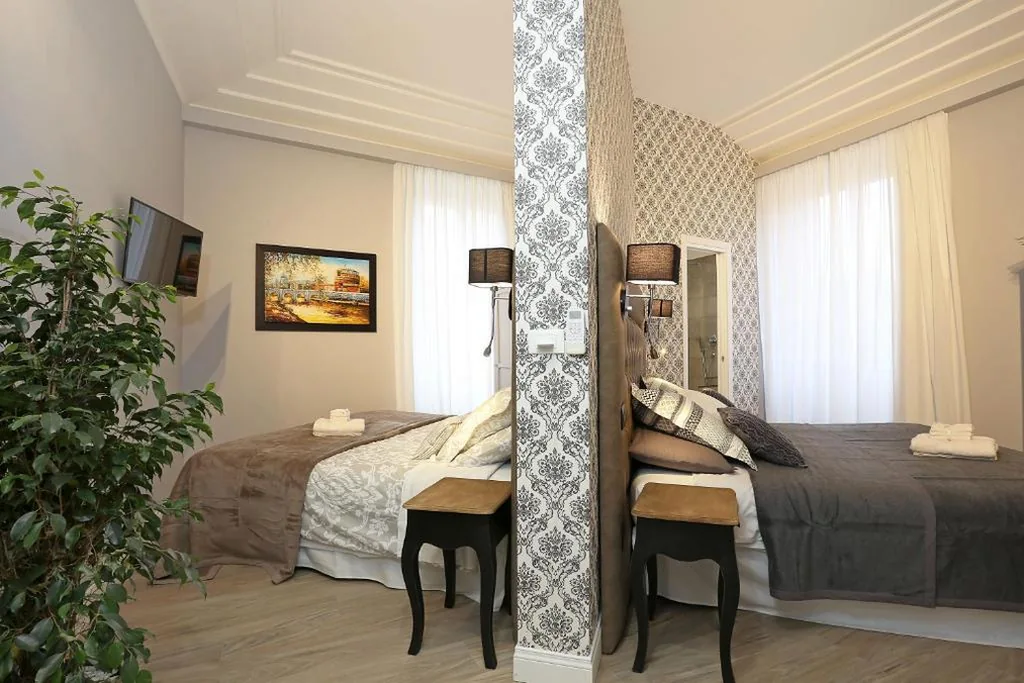 Deluxe Quadruple Room — Capricci Romani