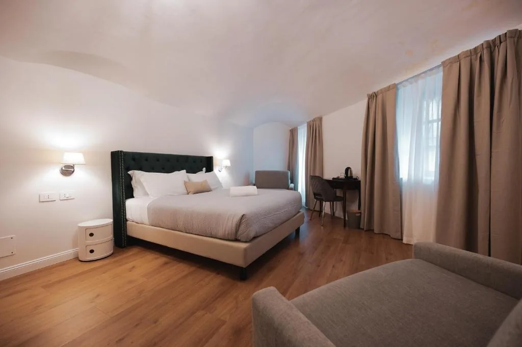 Camera Quadrupla Deluxe — Carlo Felice Boutique Hotel