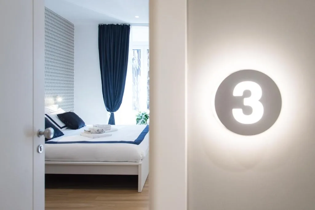 Deluxe Quadruple Room — Colosseum suites by Glen